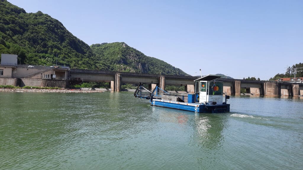 Mastercard Garbage collection boat on Zvornik Lake in Bosnia and Herzegovina